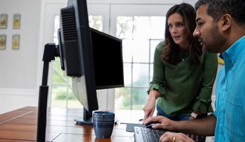 Couple using their computer